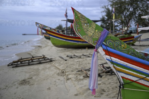 Fishing boats on the beach of Chathing Phra, near Hat Yai, Songkhla province, Thailand, Asia