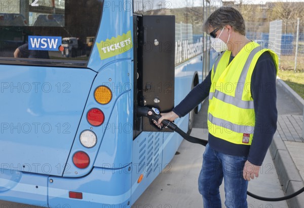 Herten, North Rhine-Westphalia, Germany - Wuppertal hydrogen bus fills up with H2 hydrogen at an H2
