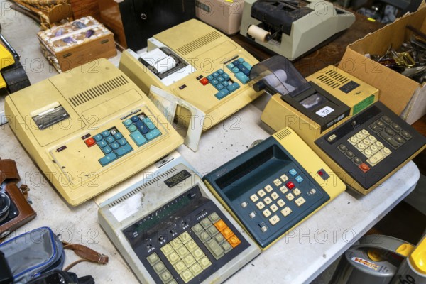 Vintage mechanical calculator adding machines on display at auction, UK