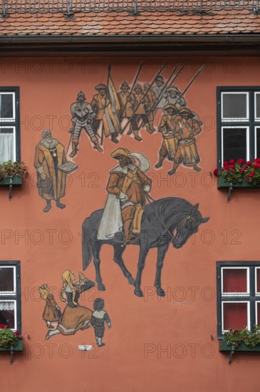 Wall painting on a residential building, showing the Kinderzeche, commemorating the peaceful
