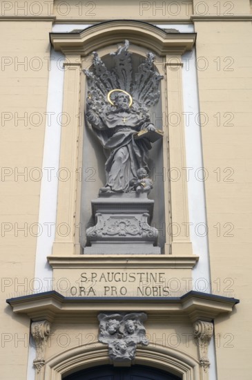 Figure of St Augustine in a niche above the entrance portal of St Augustine's Church,
