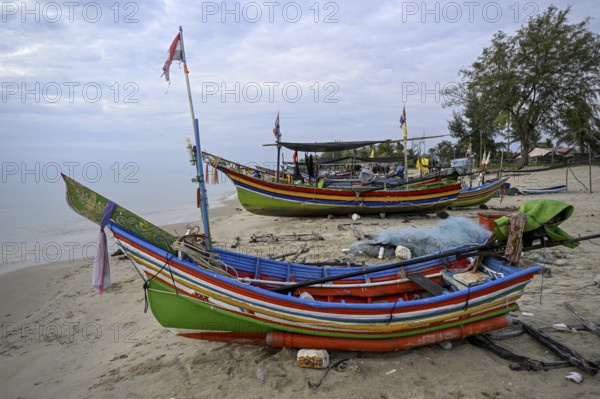 Fishing boats on the beach of Chathing Phra, near Hat Yai, Songkhla province, Thailand, Asia