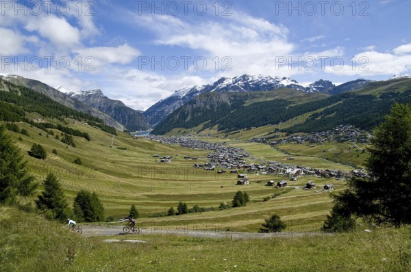 View of the high valley of Livigno, with Lago di Livigno in the background, in the province of