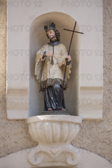 Sculpture of St Nepomuk in a niche on a residential building, Simmelsdorf, Middle Franconia,
