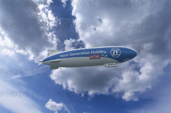 Zeppelin as an advertising medium in the cloudy sky over Rottweil Baden-Württemberg, Germany,