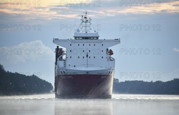 RoRo cargo ship Super Fast Levante travelling through the Kiel Canal at sunrise, Kiel Canal,