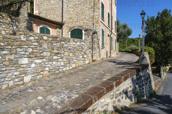 La Casa del Priore, a historic building and restaurant on the castle hill of Andora, province of