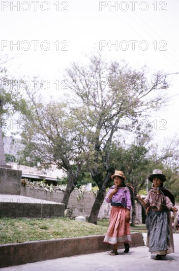 Two women walking in the park, Ayacucho, Peru, South America 1962, South America