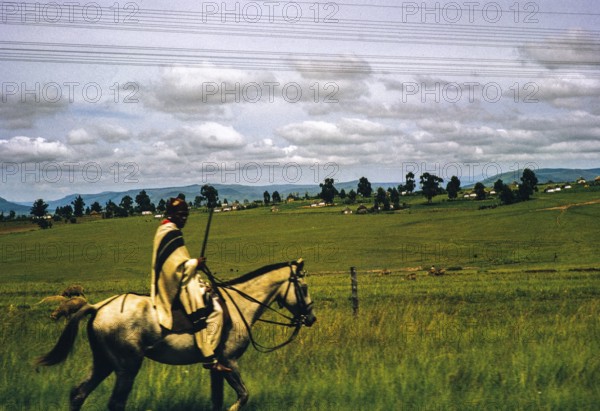 Caption: Bantu rider, probably South Africa, 1960s