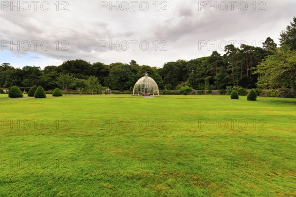 Garden, lawn with greenhouse on the horizon, Muckross House & Gardens, Killarney National Park,