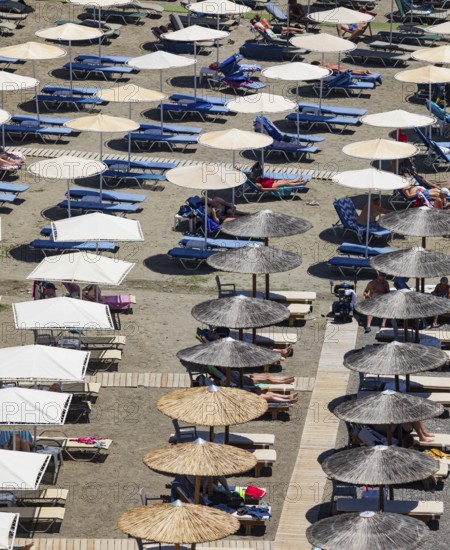 Parasols on Agia Galini beach, Agia Galini, south coast, Crete, Greece, Europe