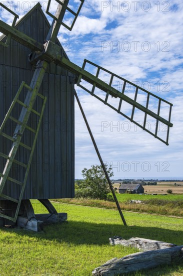 Three traditional historic windmills (Resmo väderkvarnar) in the village of Resmo on Öland, Kalmar