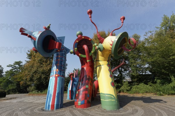 Sculpture of the Nessy family in bright colours, sea monster, aeration structure for Düsseldorf's