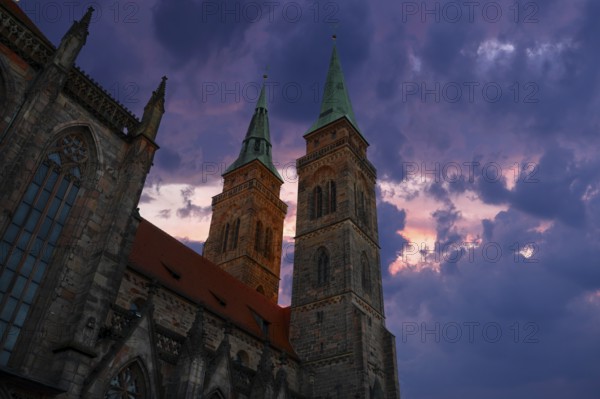Towers of St Sebald's Church in the evening light, Nuremberg, Middle Franconia, Bavaria, Germany,