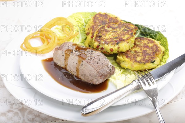 Swabian cuisine, medallions of wild boar with savoy cabbage cakes, meat dish, roasted, hearty, home