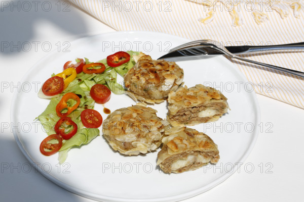 Swabian cuisine, meatballs wrapped in almonds, mixed minced meat, meatballs filled with cheese,