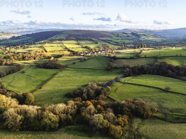 Farms over Trecastle from a drone at sunset, Brecon Beacons National Park, Powys, Wales, England,