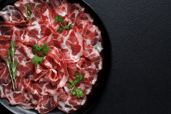 Sliced cured ham, prosciutto, italian dish, delicacy, parma ham, top view, no people