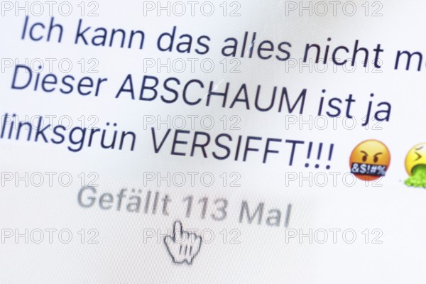 Symbolic photo on the topic of hate comments in social networks. A comment on Instagram says