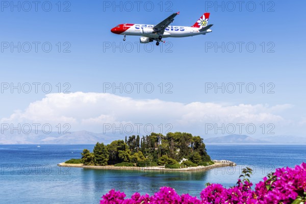 An Edelweiss Airbus A320 aircraft with the registration HB-JJK at Corfu Airport, Greece, Europe