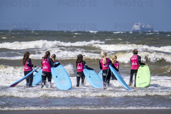Course for surfers, surfing beginners, on the beach of Scheveningen, Netherlands