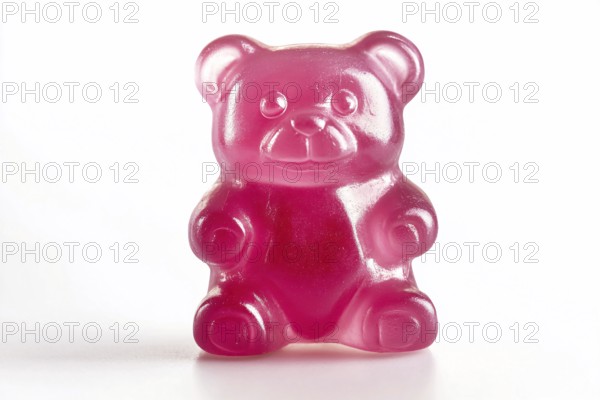 Cute opink jelly bear fruit gum candy on white background. Generative Ai, AI generated