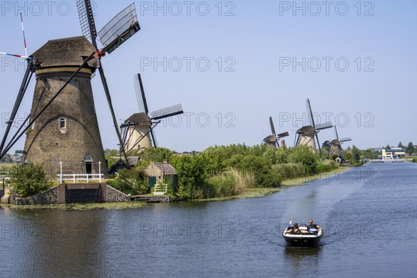Kinderdijk, 18 windmills designed to pump water from the polders to utilise the land, one of the