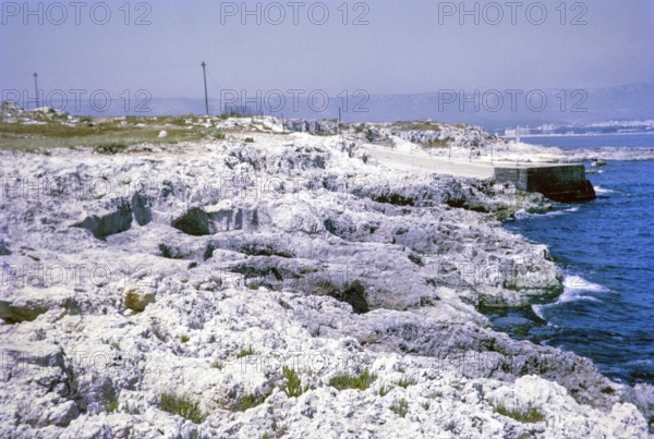 Bronze Age rock cut tombs, prehistoric village at Thapsos, Sicily, Italy, Europe 1969, Europe