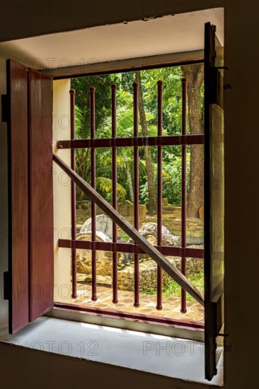 Open window of old colonial house with patio and garden in the historic city of Olinda, Olinda,