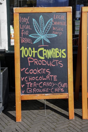 Advertising board on a cannabis shop in the pedestrian zone of The Hague, Holland, Netherlands