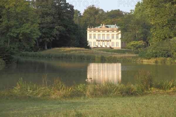 Landscape with classicist castle and reflection in the lake, Schönbusch Park, Aschaffenburg, Lower