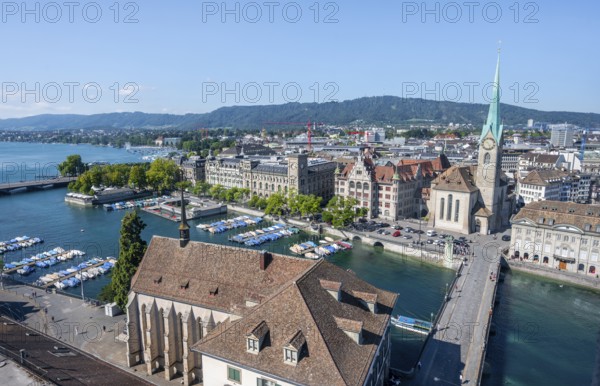 View over the old town of Zurich with river Limmat, church Fraumünster and Münsterbrücke, from the