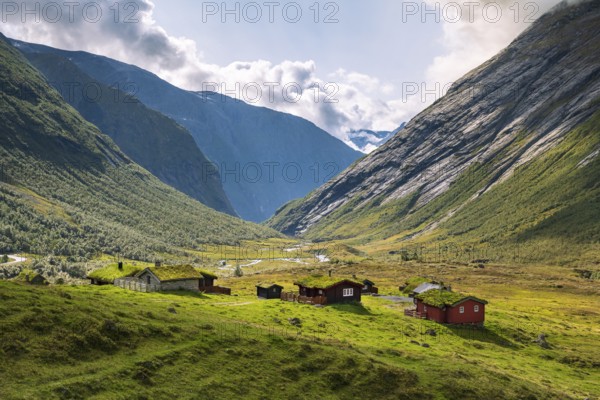 Traditional cabins with grass roofs in the mountain valley, Skjerdingsdalssætra, Stryn, Norway,