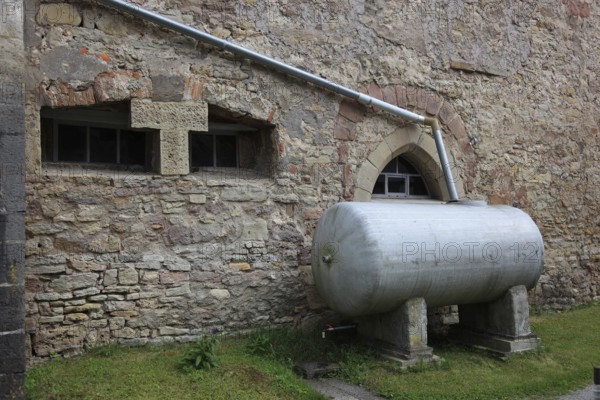 Rainwater collection tank at the fortified church Michaeliskirche, monastery church of a