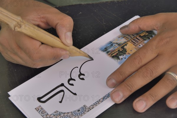 Calligrapher at work, Marrakesh, Marrakesh-Tensift-El Haouz region, Morocco, Africa