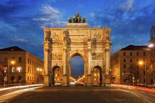 Siegestor (Victory Gate) in the evening. Motion blur of car lights because of long exposure.