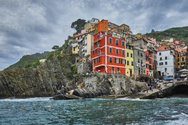 RIOMAGGIORE, ITALY, APRIL 25, 2019: Riomaggiore village popular tourist destination in Cinque Terre