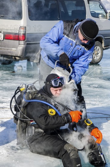 Hotwater on regulators to avoid freezing during the dive under ice, Lake Baikal, Olkhon Island,