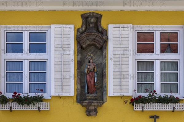 Figure of the Virgin Mary on a house façade, Nesselwang, Ostallgäu, Bavaria, Germany, Europe