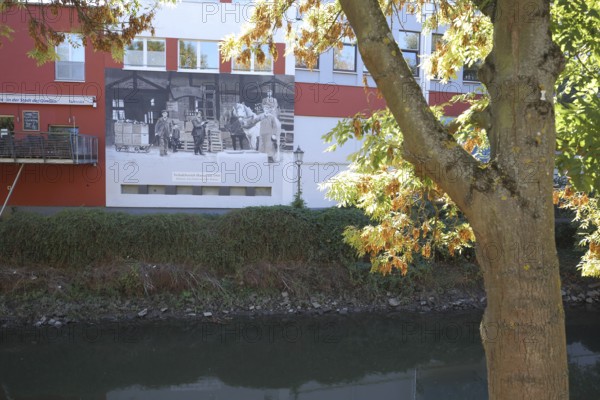 Spa garden am Nidda Ufer with mural by grafitti artist CASE on the Hassia Mineralwasser Historik