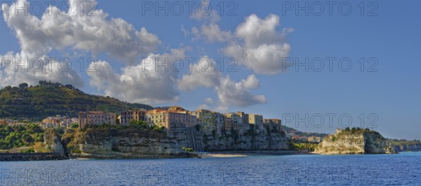 Morning city view of the medieval old town of Tropea with the church Santuario di Santa Maria,