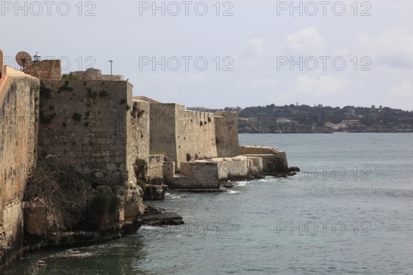Ortygia or Ortigia is the historic centre of the city of Syracuse, the walls of the Castell by the