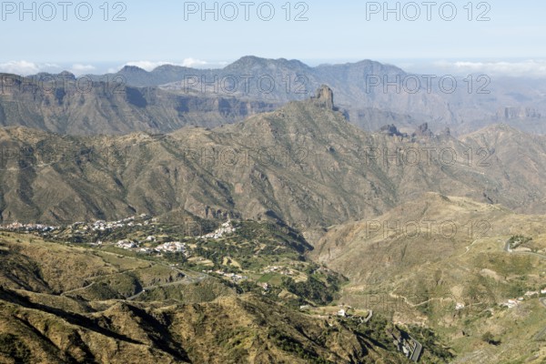View from Cruz de Tejeda, Parque Rural del Nublo, in the back Roque Batayga, below the village of