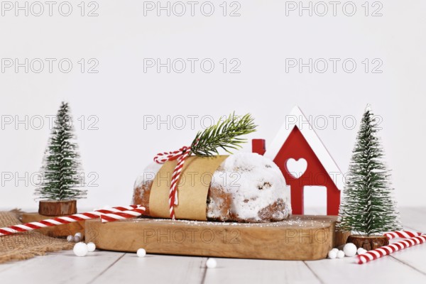 German Stollen cake, a fruit bread with nuts, spices, and dried fruits with powdered sugar