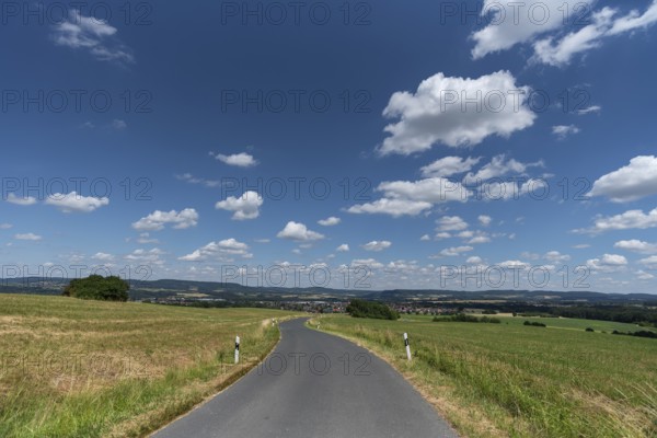 View of Franconian Switzerland, road leading to Markt Eckental, Middle Franconia, Bavaria, Germany,