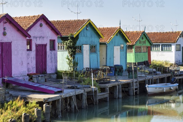 Colourfully painted wooden fishermen's huts, Le Château-d'Oléron, Oleron Island, Charente Maritime