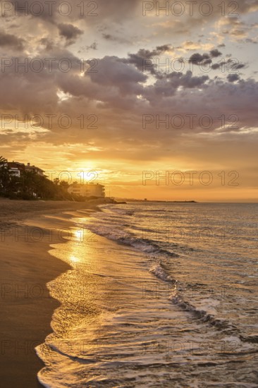 Sunrise with morning colors on a sandy beach near Tarragona, Catalonia, Spain, Europe