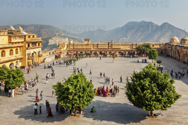 AMER, INDIA, NOVEMBER 18, 2012: Tourists visiting Amer (Amber) fort, Rajasthan, India. Amer fort is