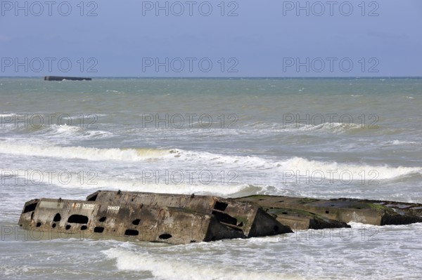 Concrete boxes, known as Phoenix Caissons, in the sea were used as breakwaters and to form an