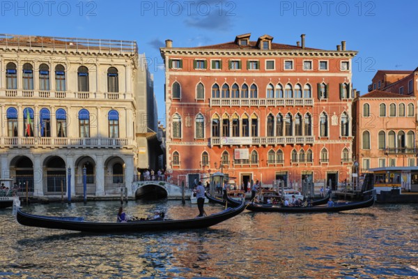 VENICE, ITALY, JUNE 27, 2018: Grand Canal with boats and gondolas on sunset, Venice, Italy, Europe